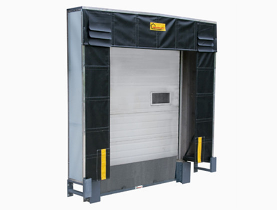 A loading dock seal with black padding and a protective cover, surrounding a closed white industrial overhead door—ideal for those seeking quality dock seals and bumpers.